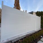 white aluminum horizontal fence
